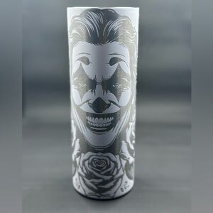 Laser engraved Halloween themed tumbler. It is 20oz and glows in the dark.
